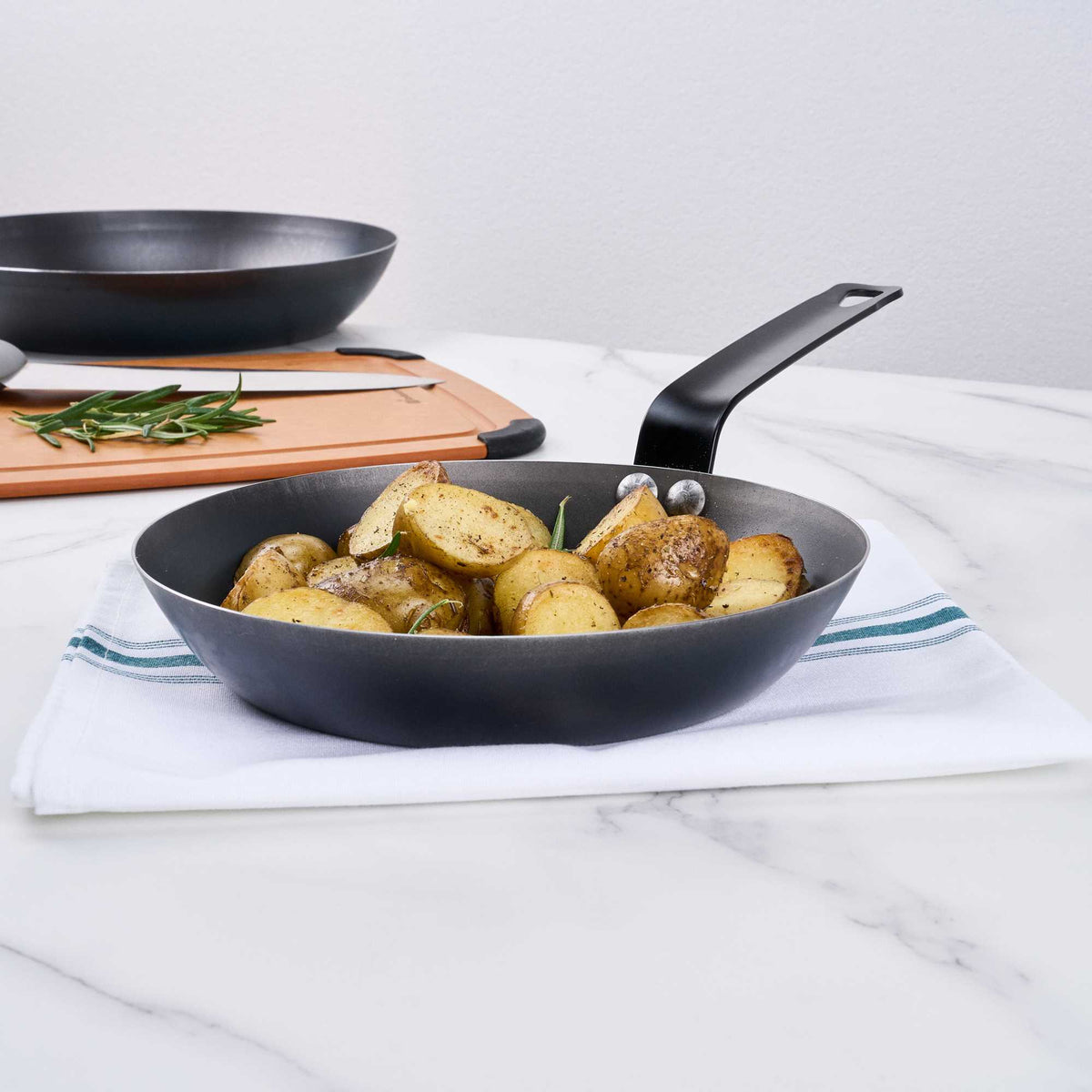 Met Lux 1 Black Carbon Steel 9" Pre-Seasoned Fry Pan and 1 Black Silicone Pan Handle Sleeve