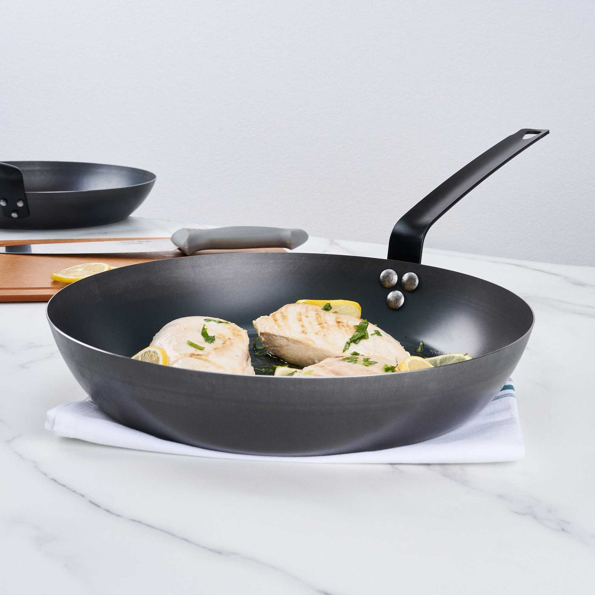 Met Lux 1 Black Carbon Steel 13" Pre-Seasoned Fry Pan and 1 Black Silicone Pan Handle Sleeve