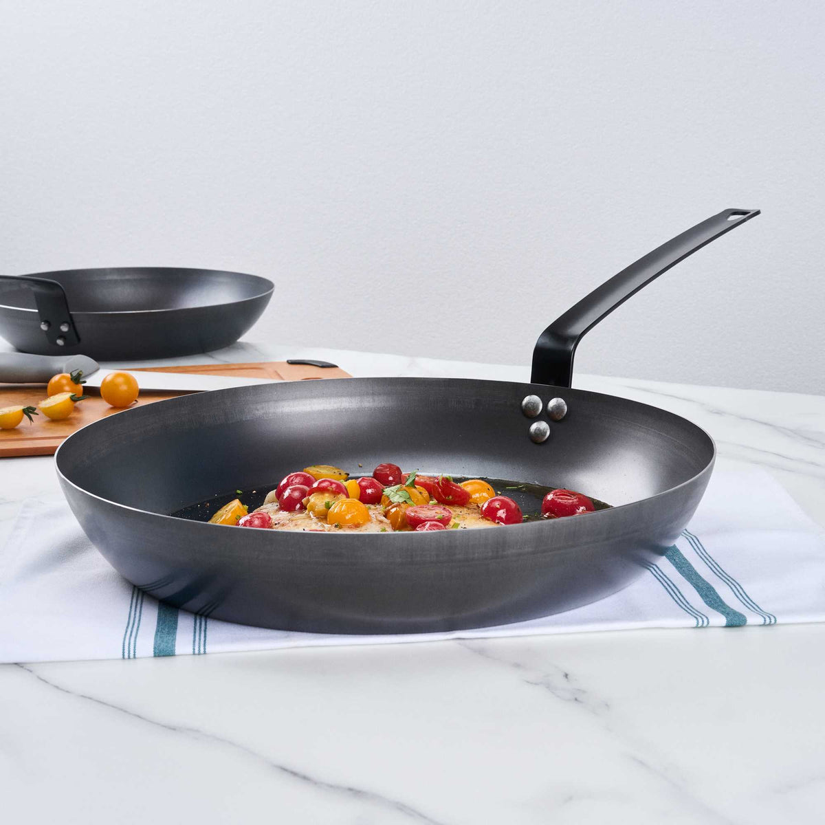 Met Lux 1 Black Carbon Steel 14" Pre-Seasoned Fry Pan and 1 Black Silicone Pan Handle Sleeve