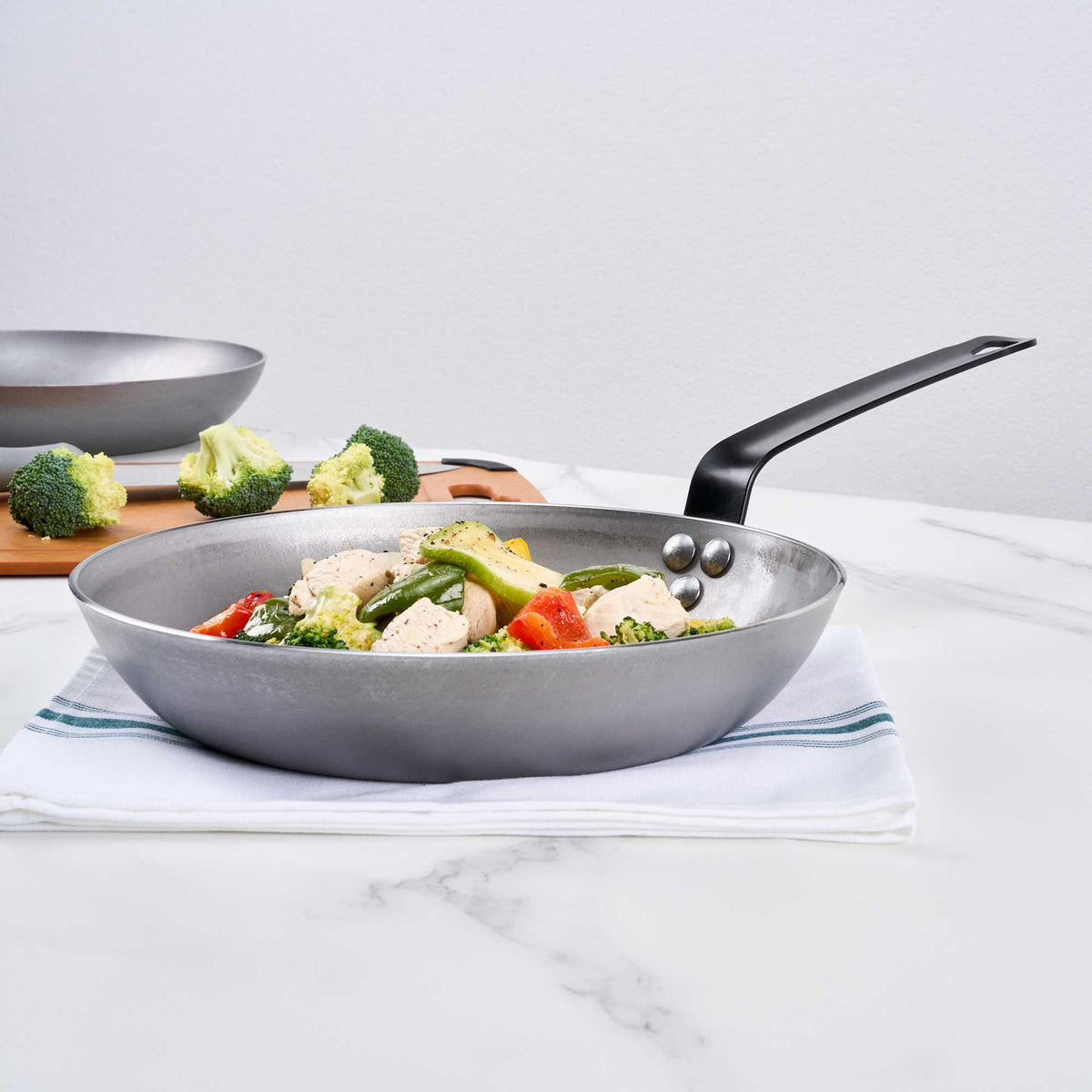 Met Lux 1 Carbon Steel 10" Non-Stick Fry Pan and 1 Black Silicone Pan Handle Sleeve
