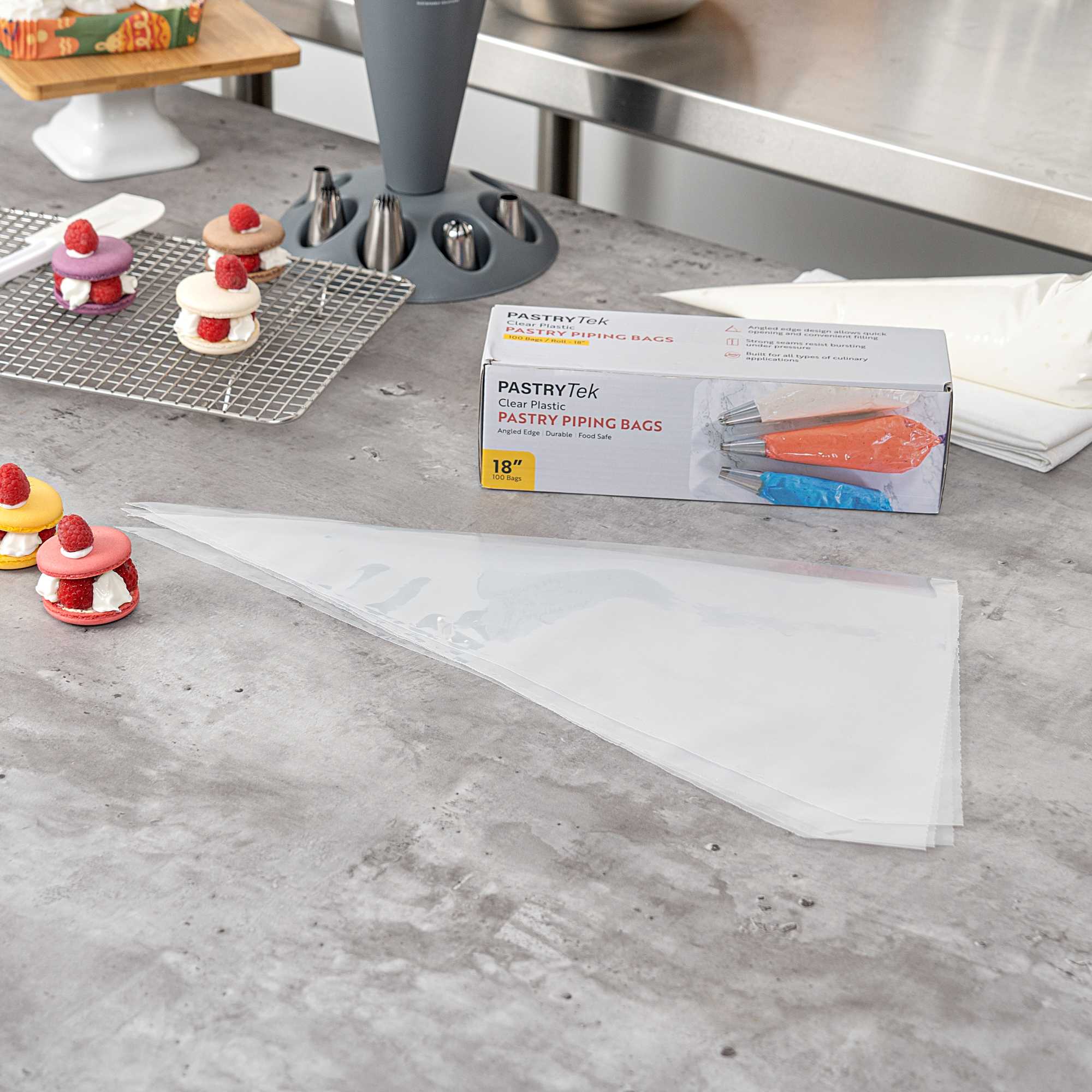 Pastry Tek Clear Plastic Disposable Pastry Piping Bag - 100 Bags / Roll, Angled Edge - 18" - 1 count box