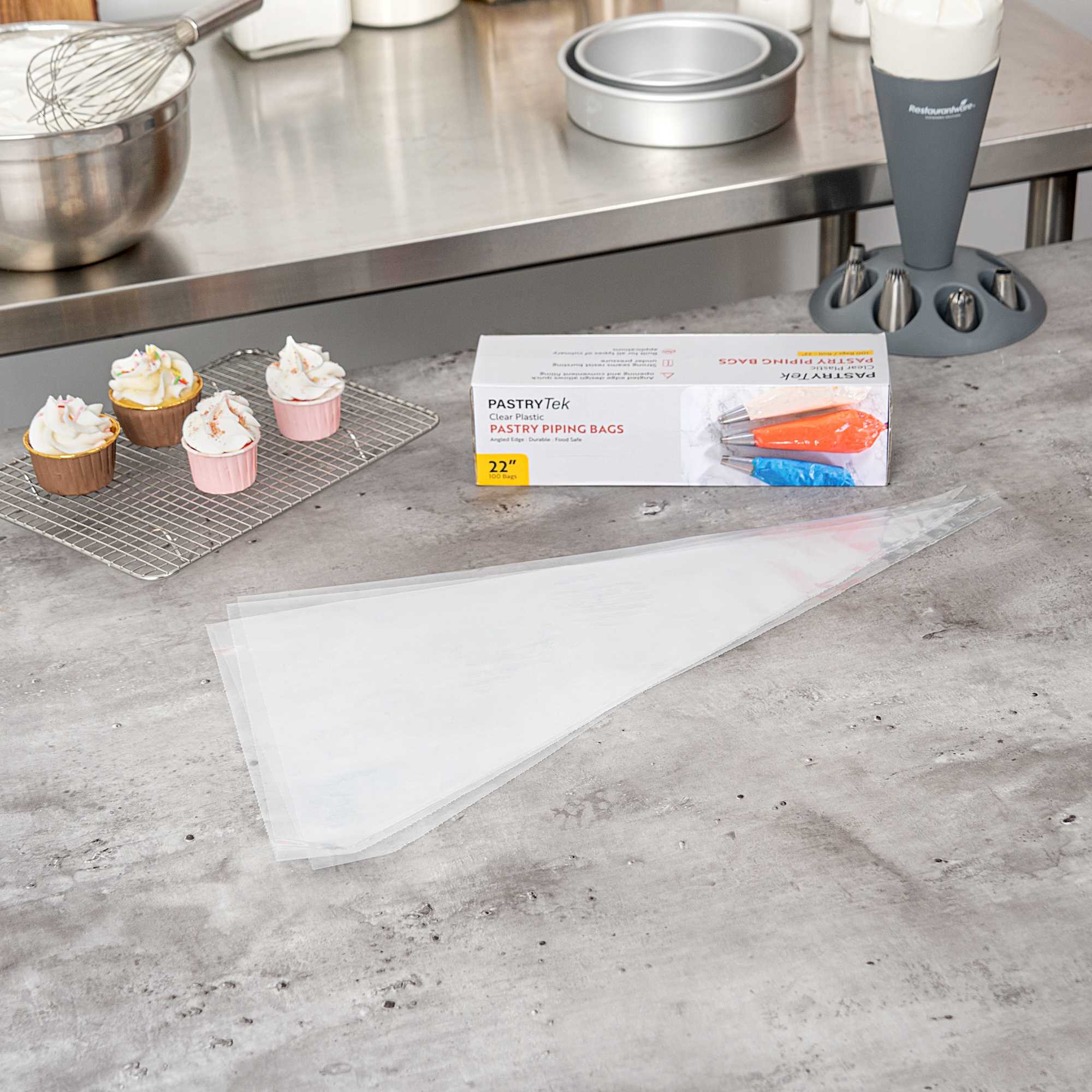 Pastry Tek Clear Plastic Disposable Pastry Piping Bag - 100 Bags / Roll, Angled Edge - 22" - 1 count box