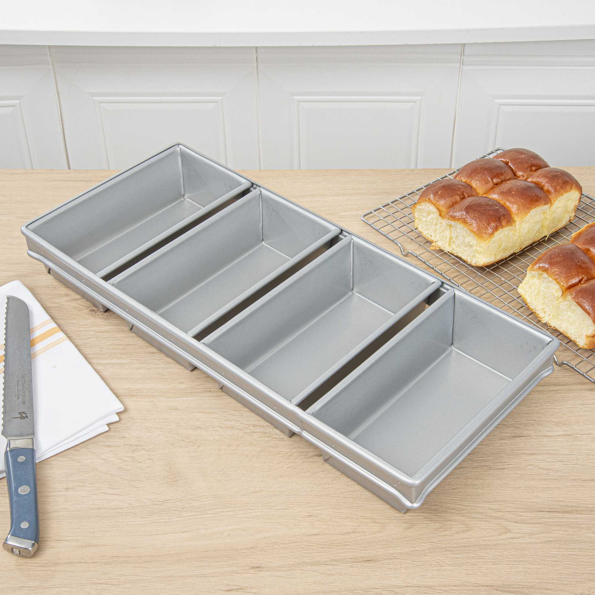 Pastry Tek 1 lb Glazed Aluminized Steel Bread Loaf Pan - 4 Strap - 22" x 9 3/4" x 3" - 1 count box