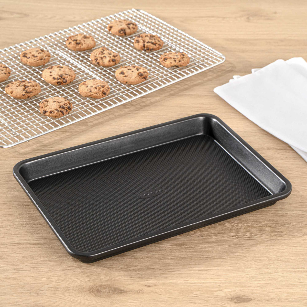 Pastry Tek Black Carbon Steel Quarter Size Sheet Pan - Non-Stick, Tapered Edge - 12 3/4" x 9" x 1 1/4" - 1 count box